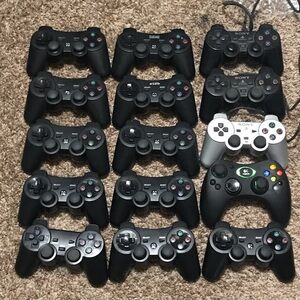 Lot of 15 PlayStation and Xbox Controllers